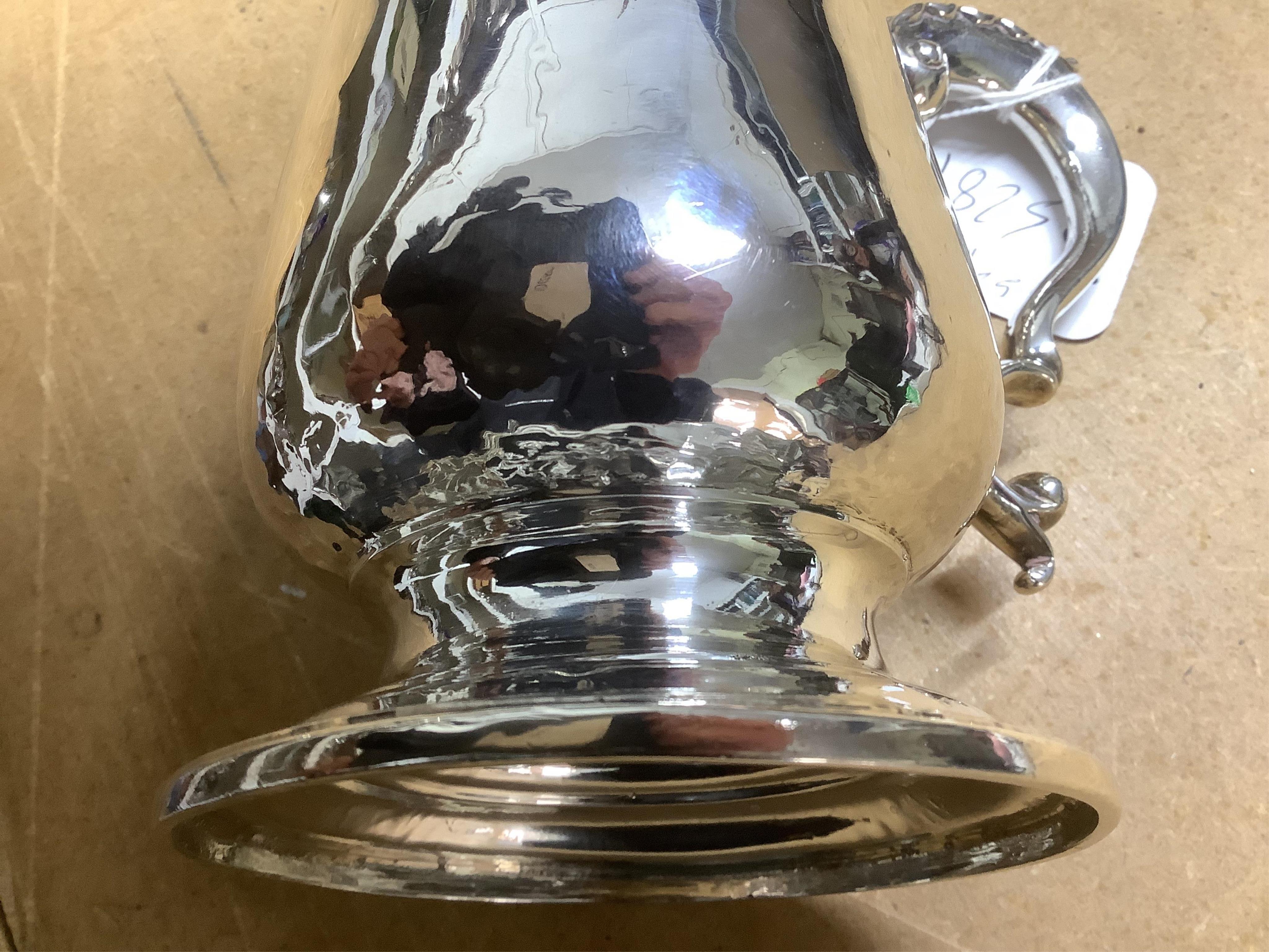 A George III silver baluster mug, with acanthus leaf capped handle, William Turton, London, 1782, height 15.5cm, 10.4oz. Condition - poor to fair